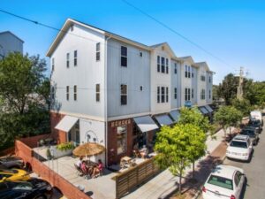 A vacant lot transformed into a mixed-use building with nine apartments, two offices, a smoothie bar, and a taproom. Image by Joshua Duke Photography. Used with permission.